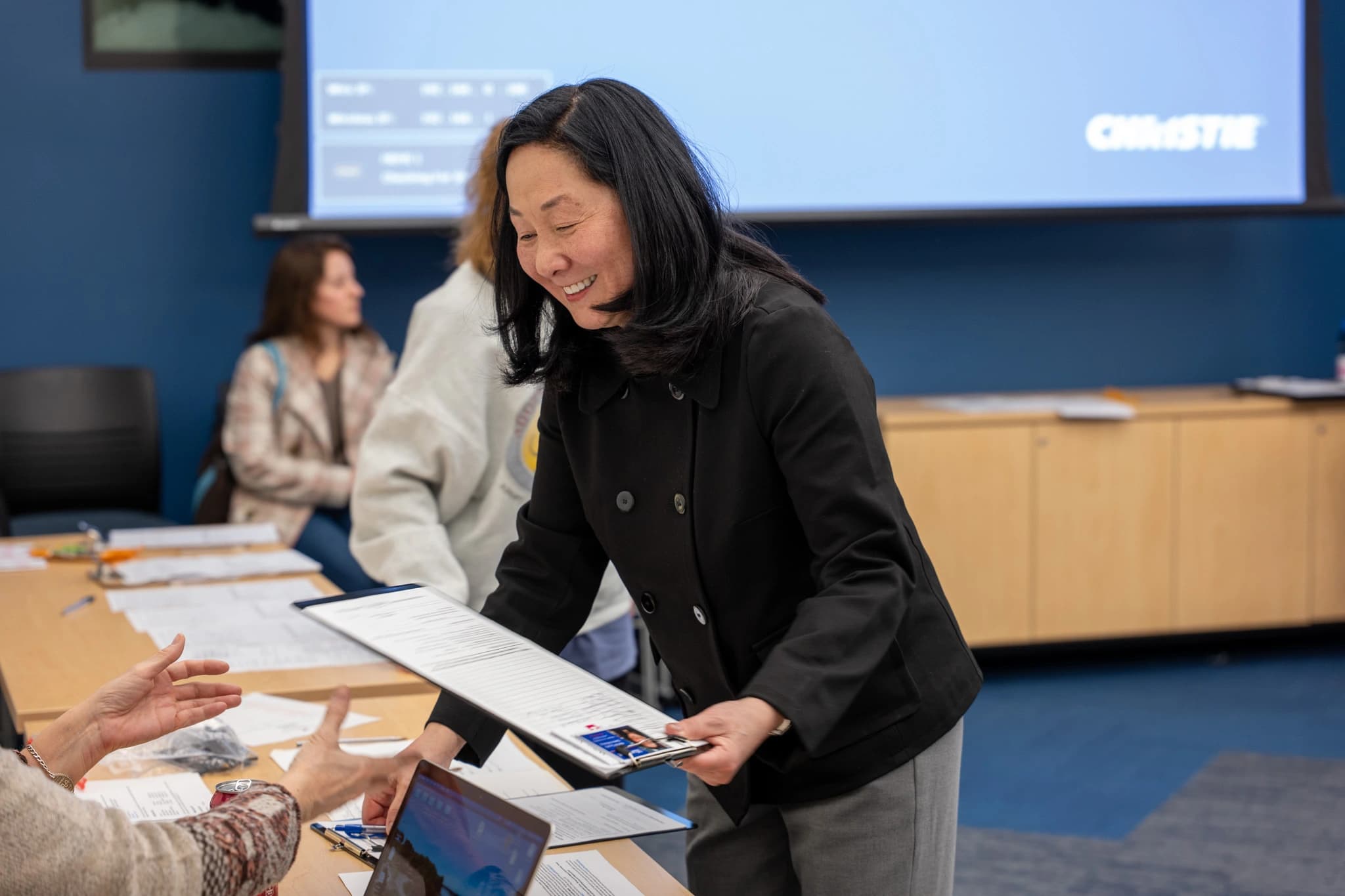 Macy Lee working with some files.